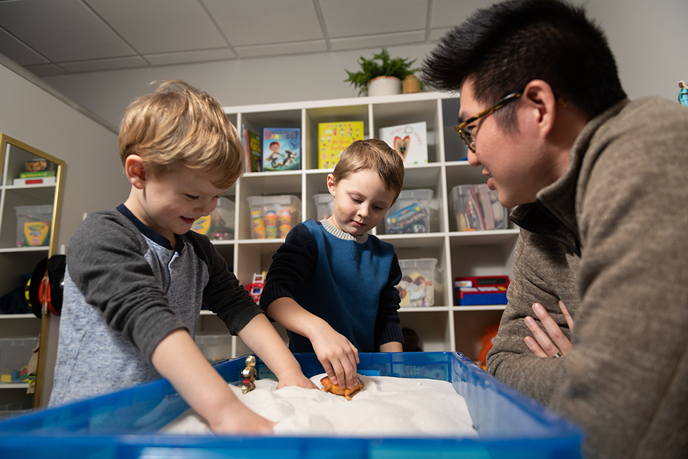 Therapist working with children at Wellspring Center for Counseling office in Sycamore IL