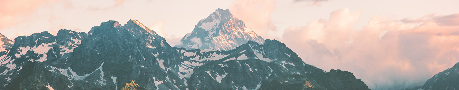 Who we are at Wellspring - Snowy mountains and clouds photo