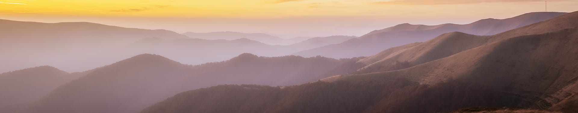 Hazy mountains at sunrise